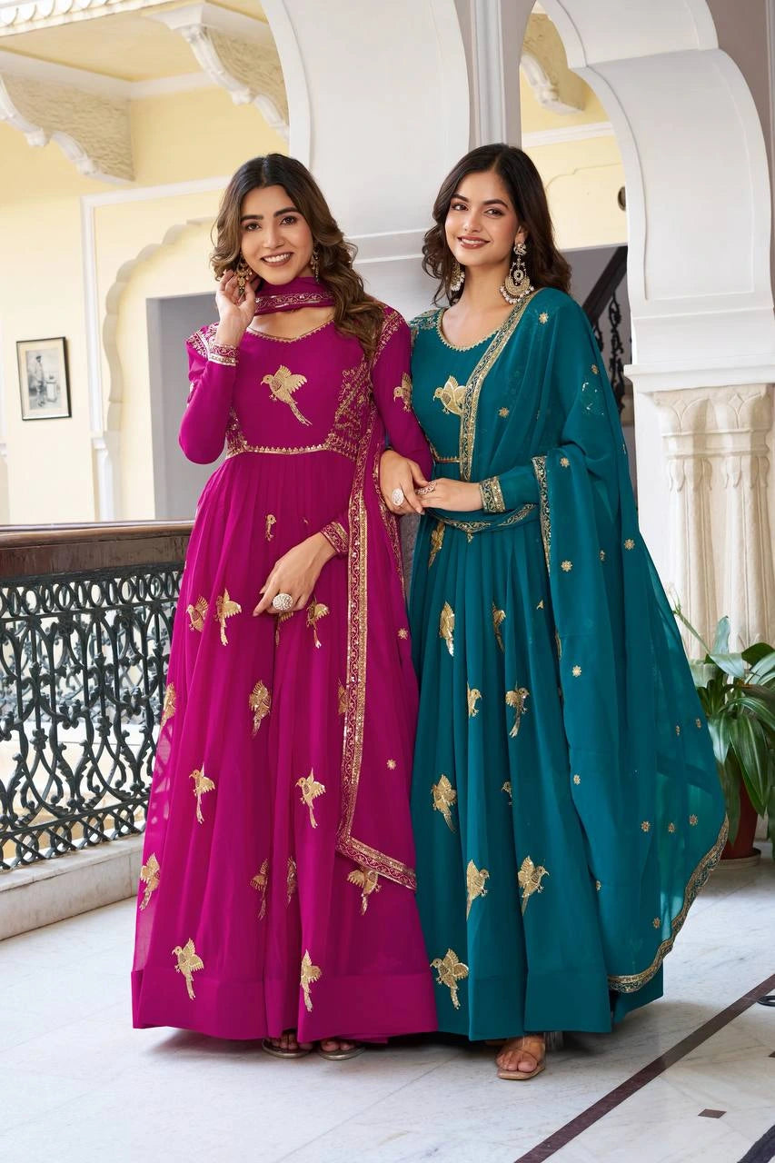 Stylish faux georgette suit in wine shade with elegant sequins and thread work patterns